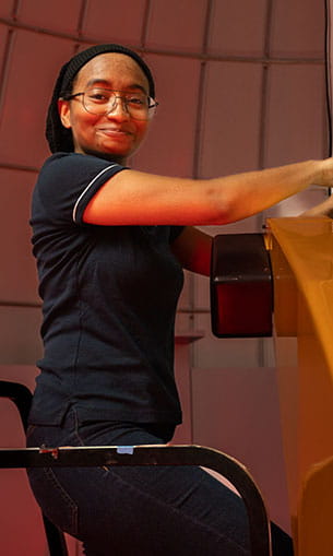 Desiree Robinson working on the Observatory telescope