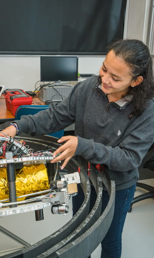 Student works on a space project.