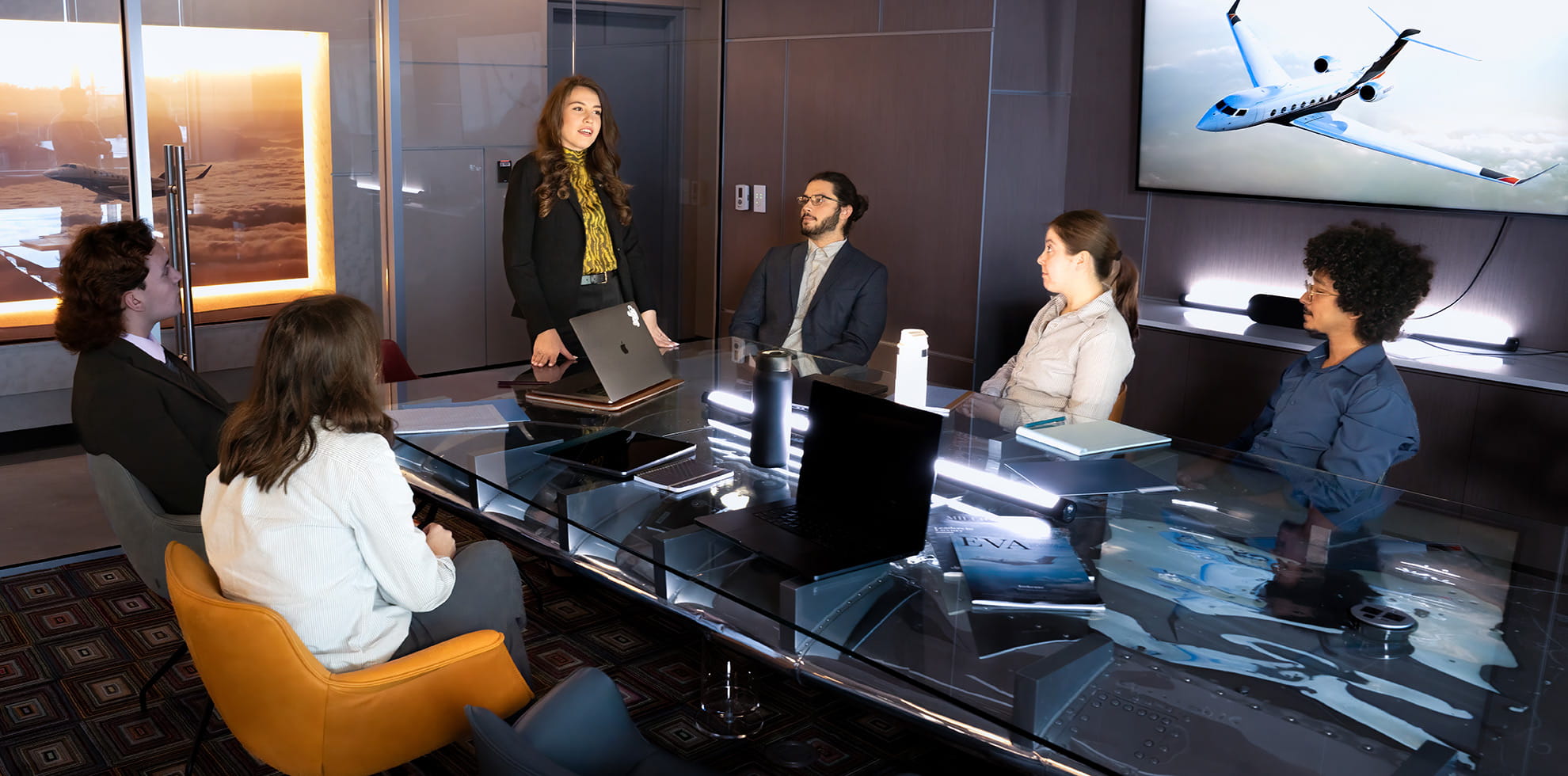 Students and interns working in a business environment