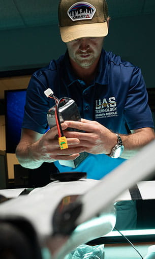 Student in the lab with a UAS