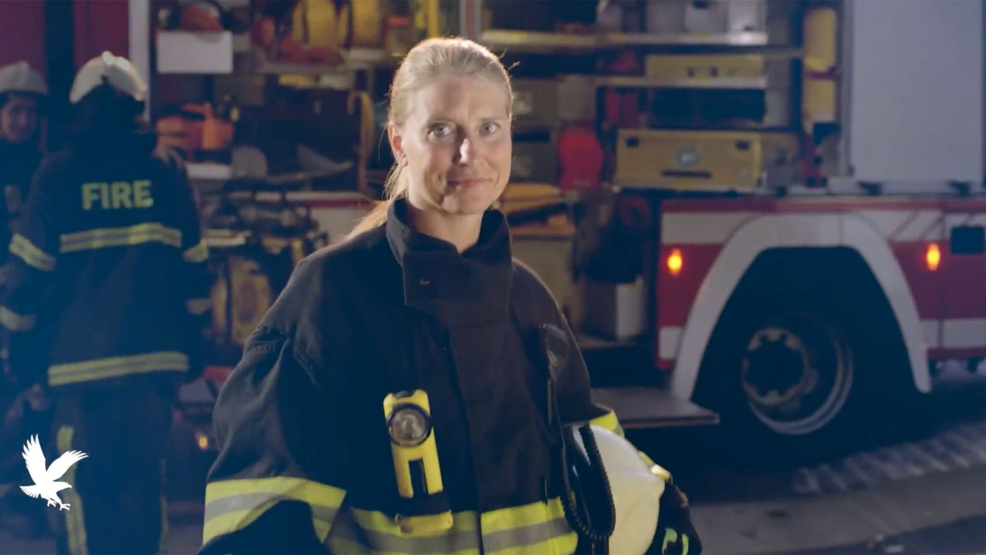 A firefighter in a firehouse