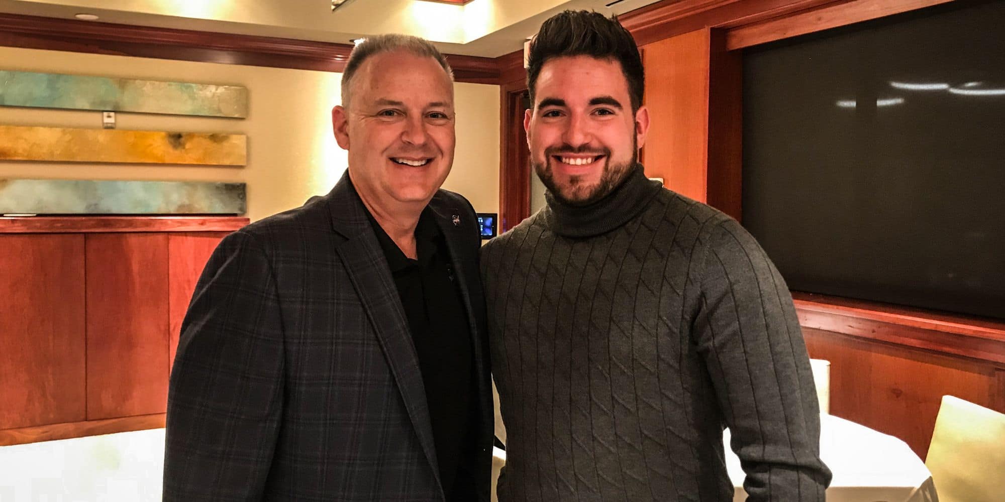 Embry‑Riddle alumnus Norman Knight (’90) and Aerospace Engineering junior William Baca III (’23) met at an admissions event in Houston, Texas. (Photo: William Baca III)
