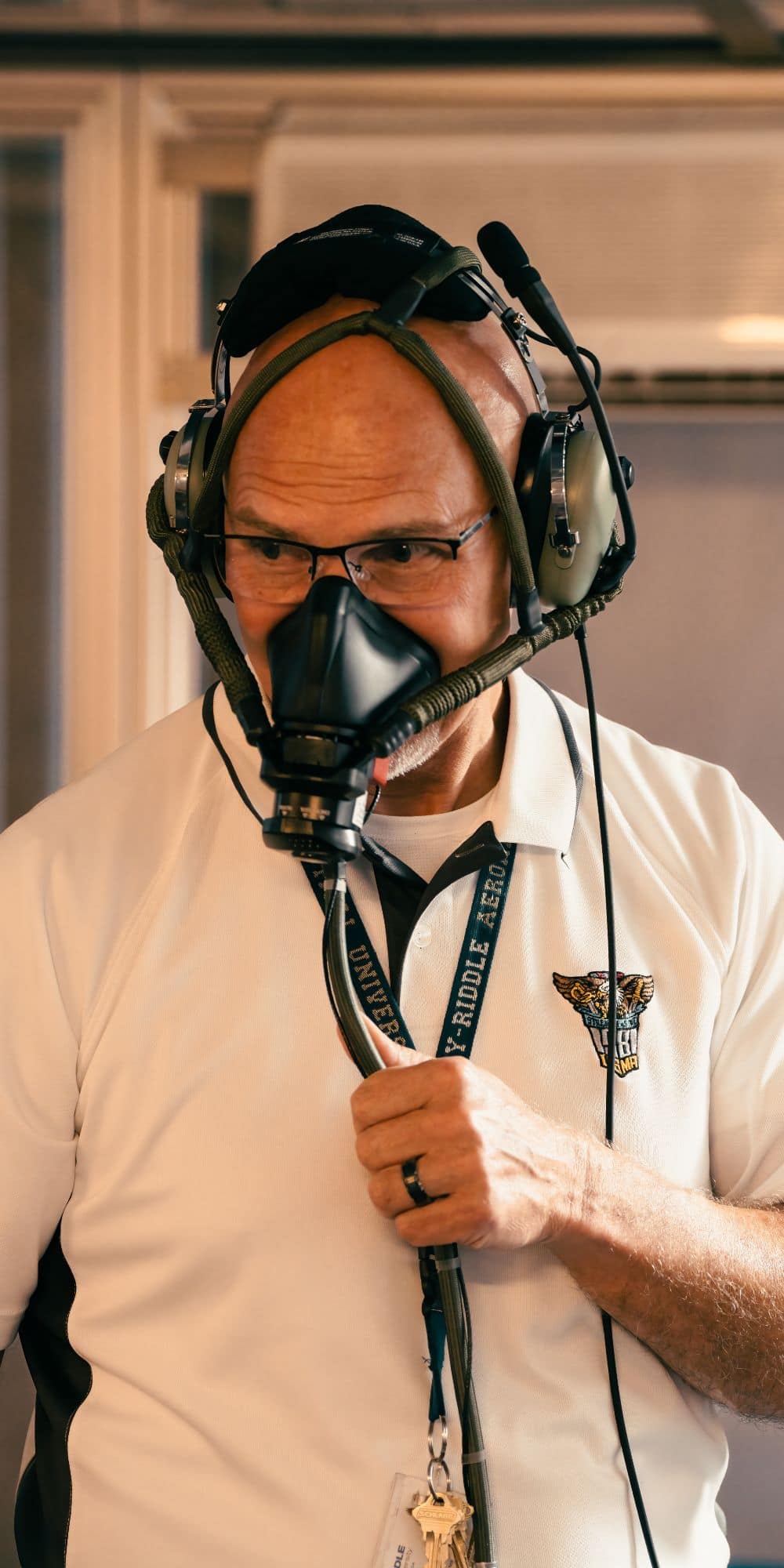 Lab Director Scott Wagner and his student team ensure that hypoxia training in the HAL is safe for students. (Photo: Embry‑Riddle / Bill Fredette-Huffman)