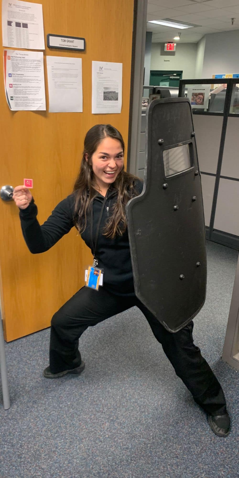 Mia Hamlin posing at the Prescott Valley Police Department during her internship.