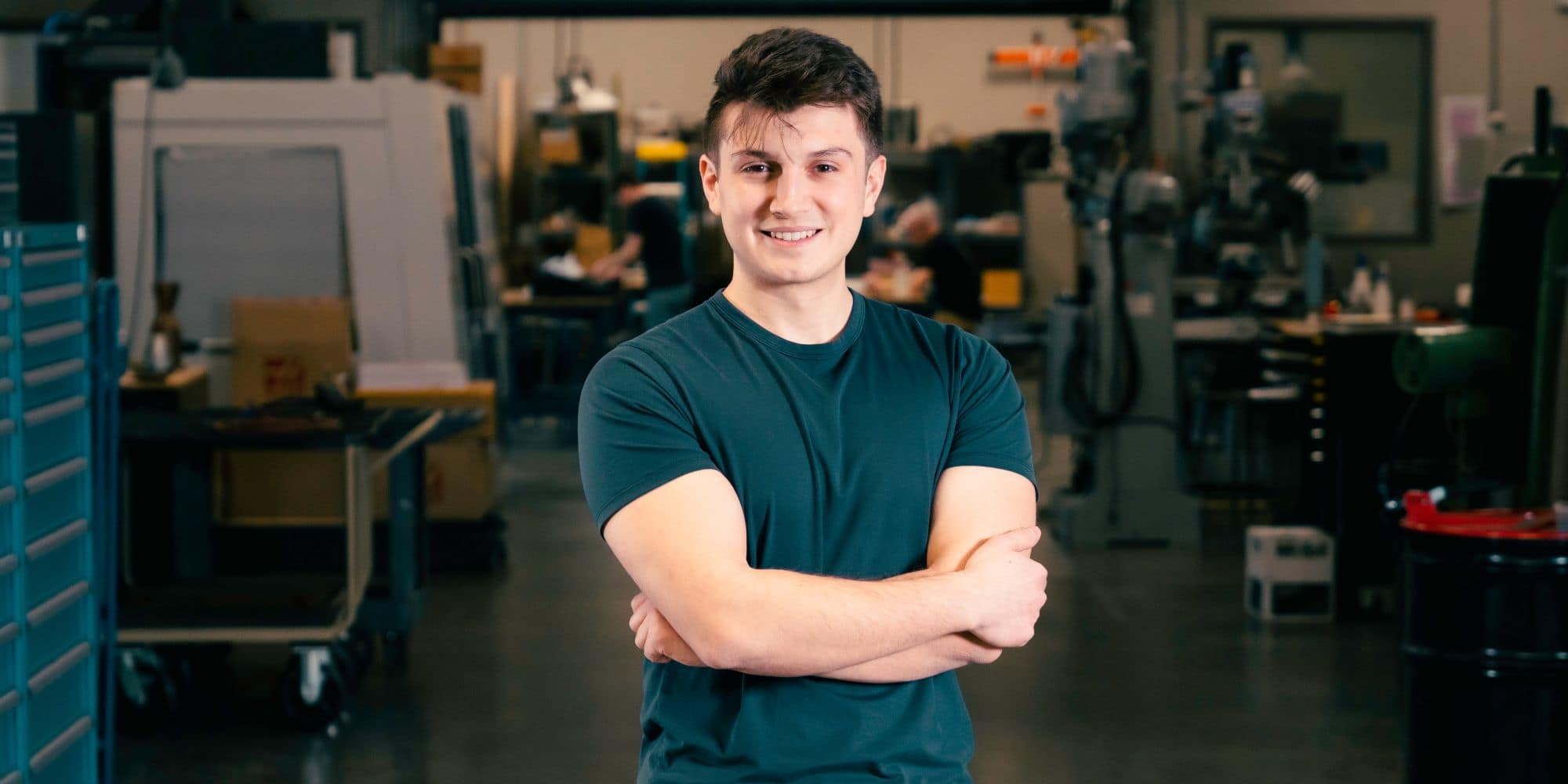 Arda Cetken in the AXFAB Machine Shop on Embry‑Riddle's Prescott Campus. (Photo: Embry‑Riddle / Connor Mcshane)