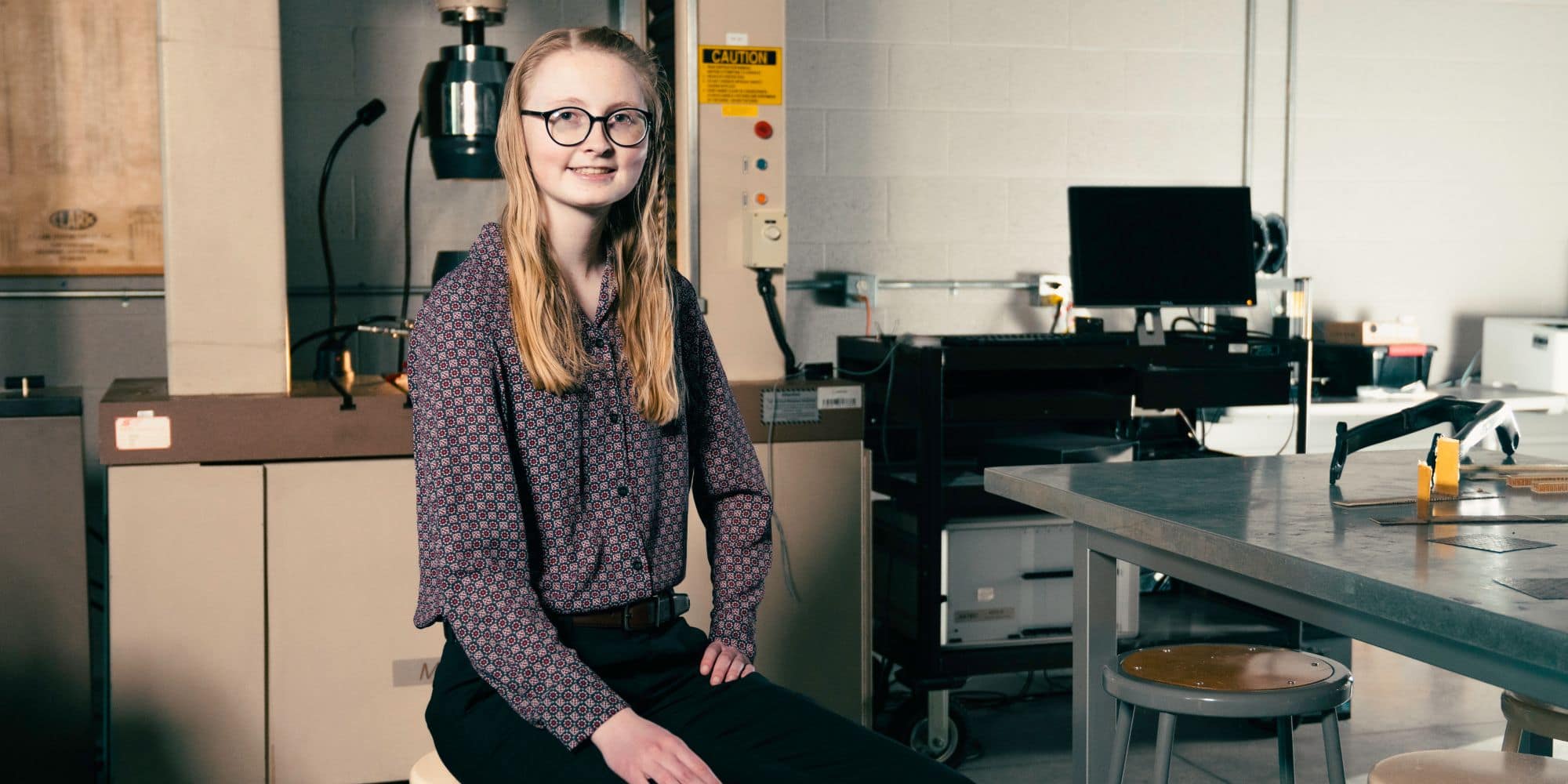 Aerospace Engineering major Alexis Elmer (‘24) in the materials lab at Embry-Riddle's Aerospace Experimentation and Fabrication Building (AXFAB) building. (Photo: Embry-Riddle / Connor McShane)