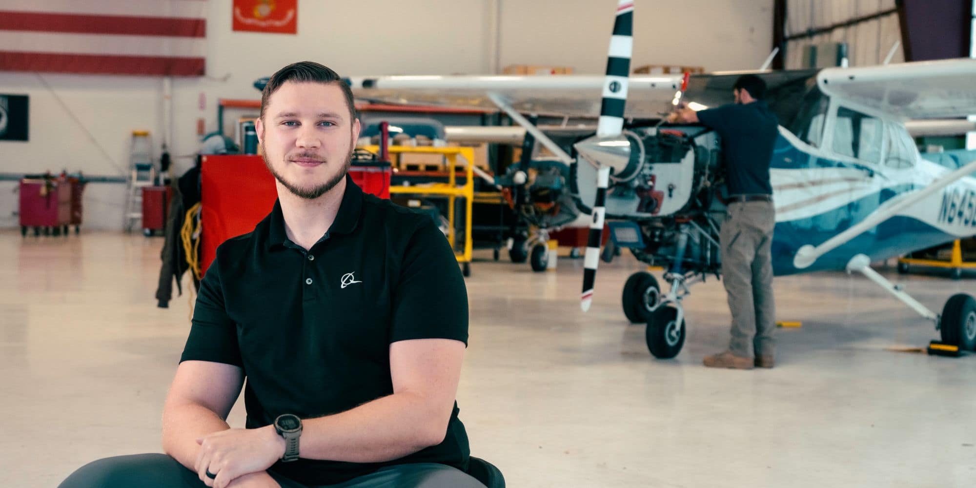 Dustin Foote in the Aviation Maintenance Hangar on Embry‑Riddle's Prescott Campus. (Photo: Embry Riddle / Connor Mcshane)