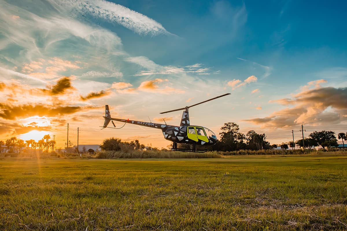 With the Florida sun as a backdrop, Ava Shelly is shown flying solo in a Robinson R-44 helicopter as part of her 16th birthday celebration. (Photo: David Brown)