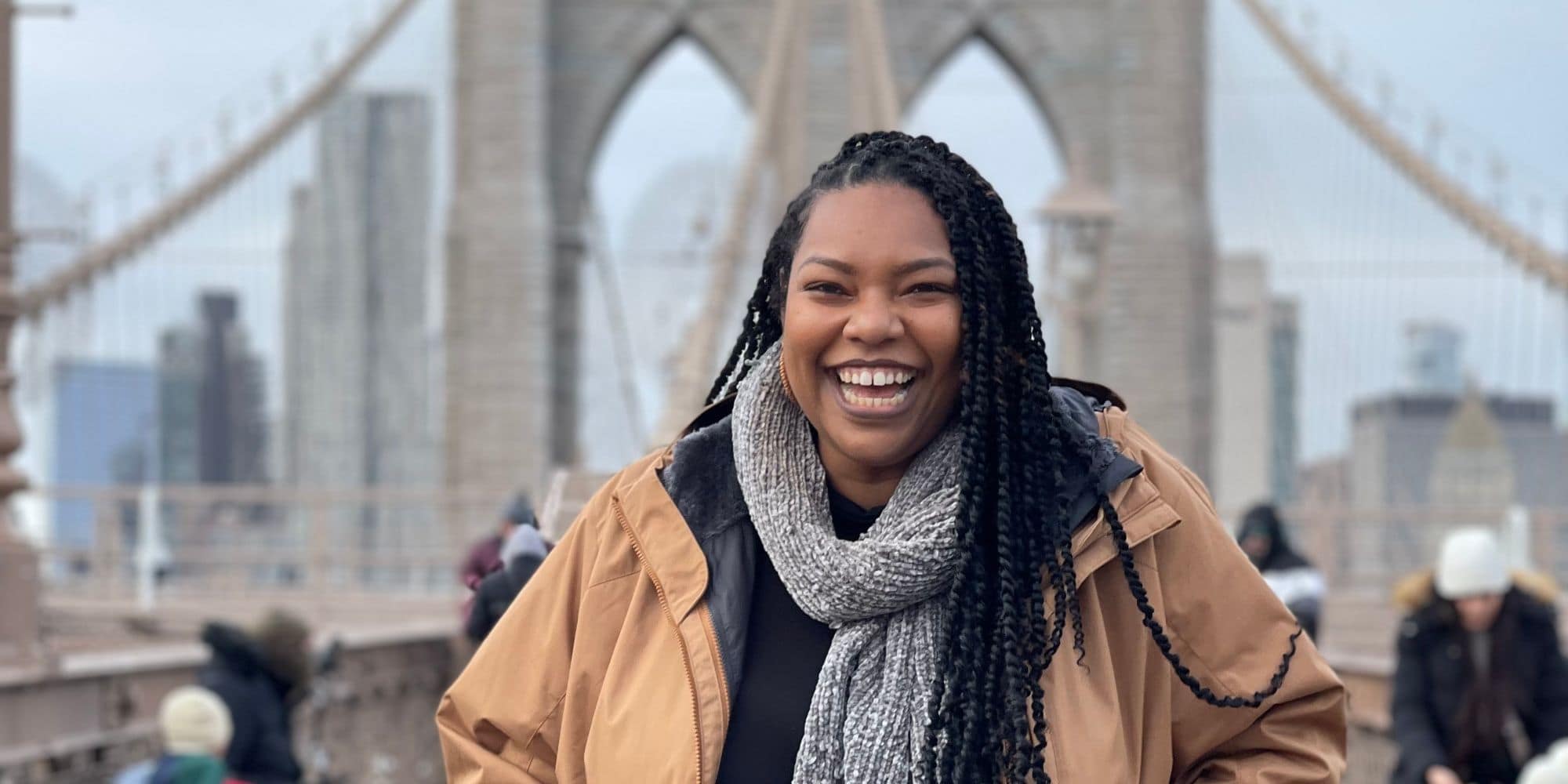 May Maryzana Maginde, shown here bundled up on the Brooklyn Bridge, is all smiles as she reflects on the start of her aviation career. (Photo: May Maryzana)