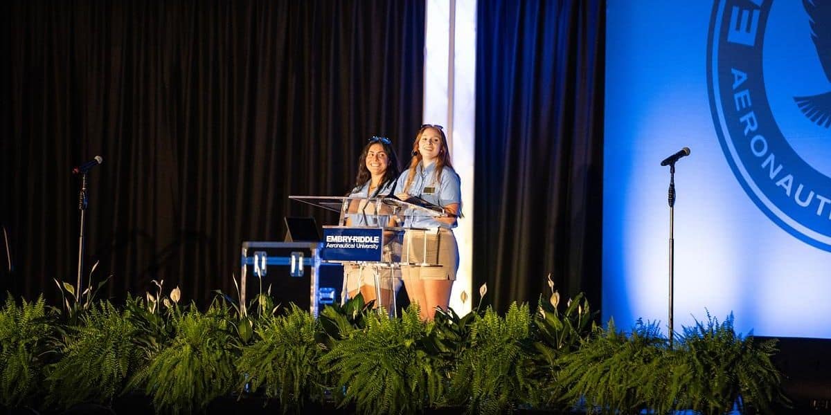 Rhiannon Hicks (right) welcoming new students to Embry‑Riddle Daytona, alongside her Orientation Team Co-Captain. (Photo: Embry‑Riddle / Bill Fredette-Huffman)