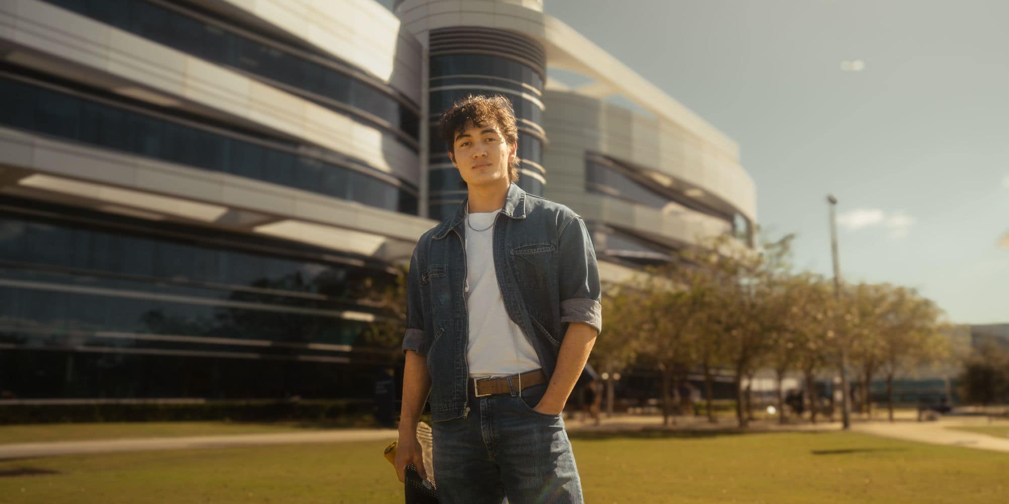 B.S. in Aviation Maintenance Science major Everett Young stands on the Daytona Beach Campus where students develop skills in maintenance, safety science, avionics and more. (Photo: Embry‑Riddle / Joseph Harrison)