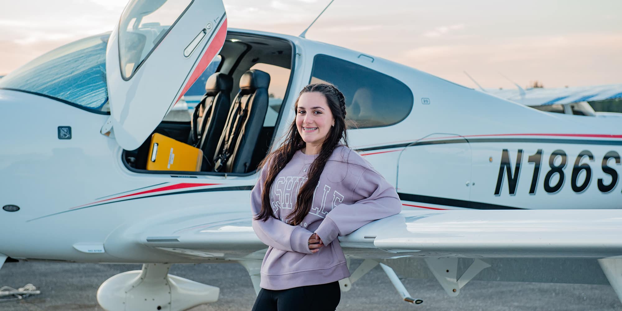 Dual Enrollment student Ava Shelly is all smiles after a solo flight in a Cirrus SR-20 on her 16th birthday. (Photo: David Brown)