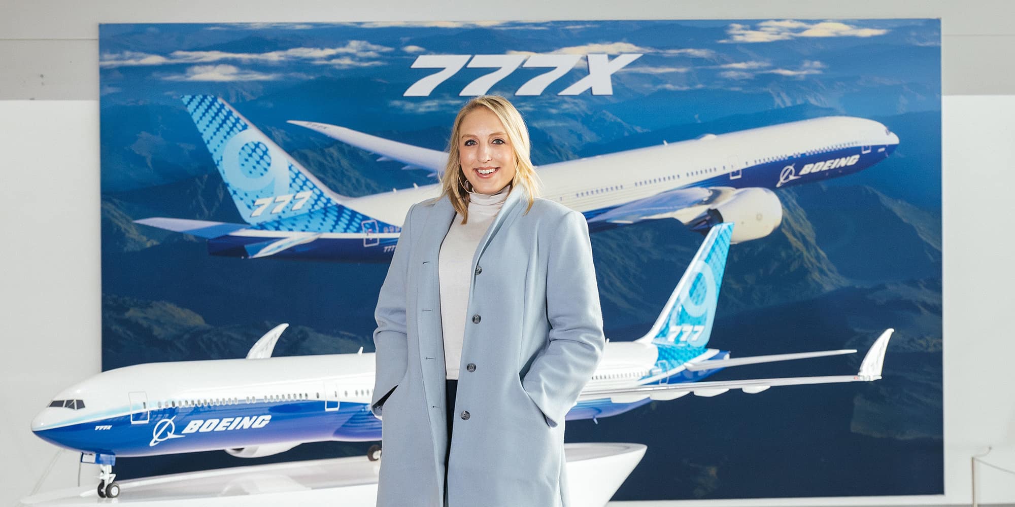 Rachelle Strong, shown here in front of a model of the 777X, is the Flight Deck Chief Engineer at Boeing Commercial Airplanes. (Photo: Rachelle Strong)