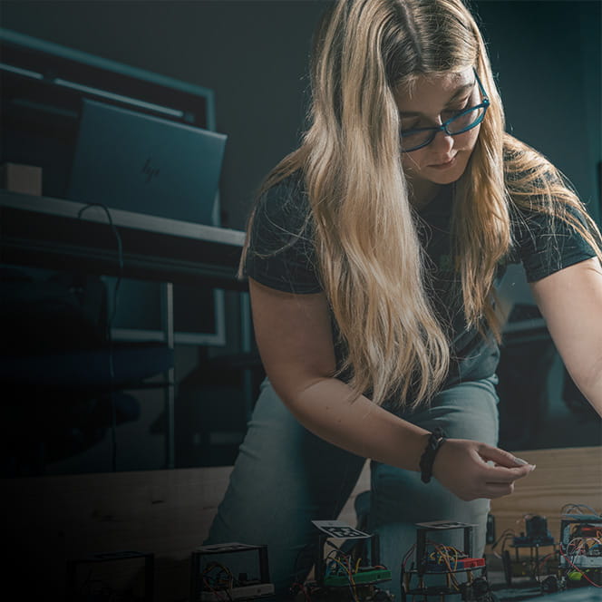 Woman works in the biology lab.