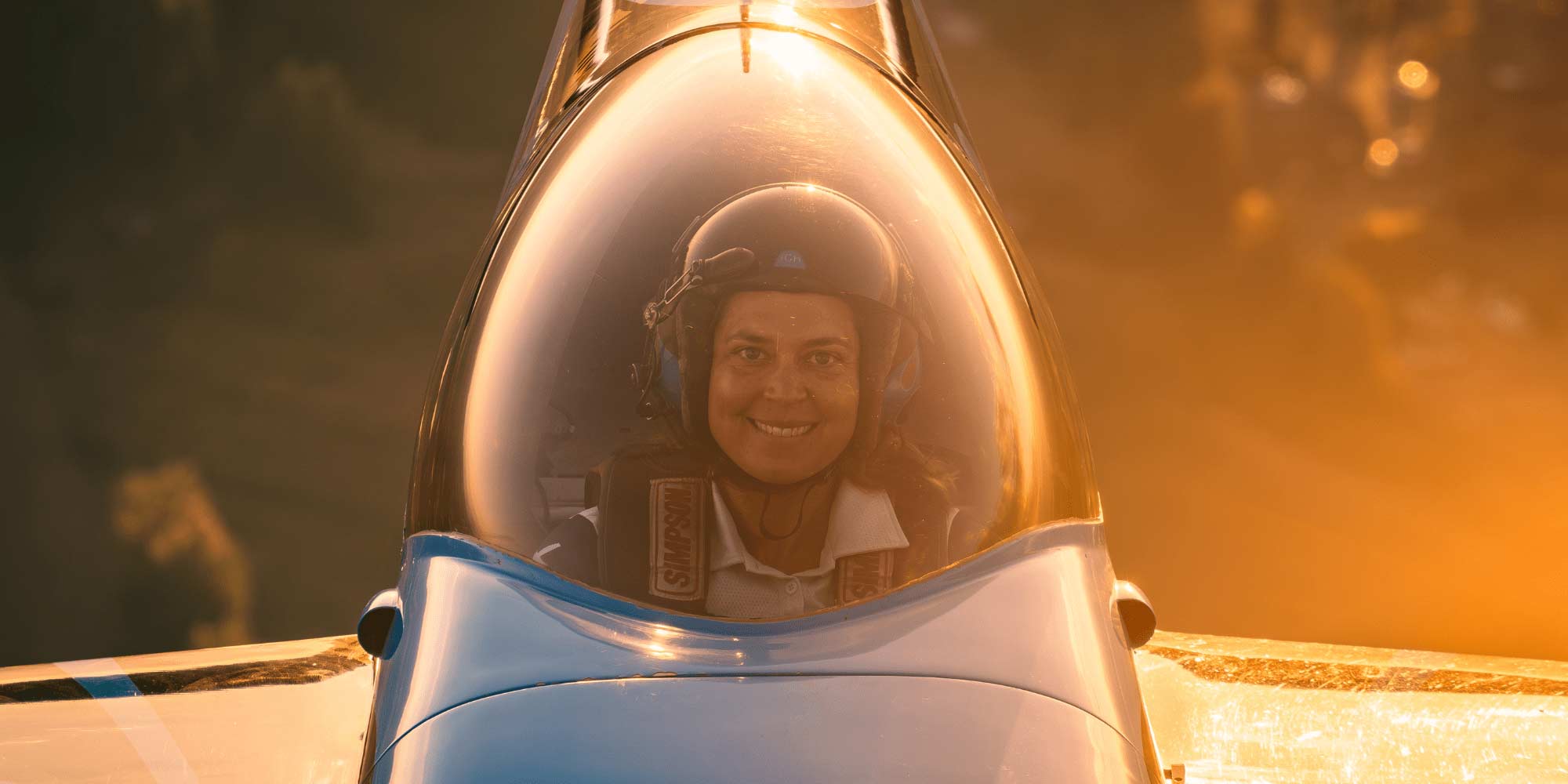 Embry‑Riddle aviation professor Melissa Burns is all smiles when she’s flying her EDGE 540 aircraft. (Photo: Aviation PhotoCrew)