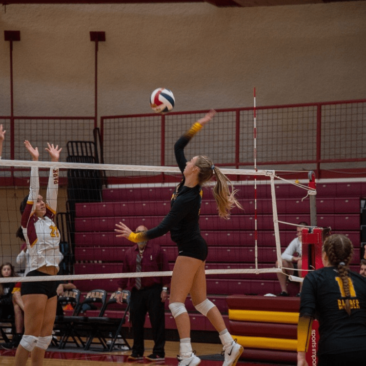 While pursuing her Aeronautical Science degree, Kelly Hansen is also an Eagle volleyball star, with 184 kills and 29 blocks in 30 matches this season. (Photo: Andrew Hansen)
