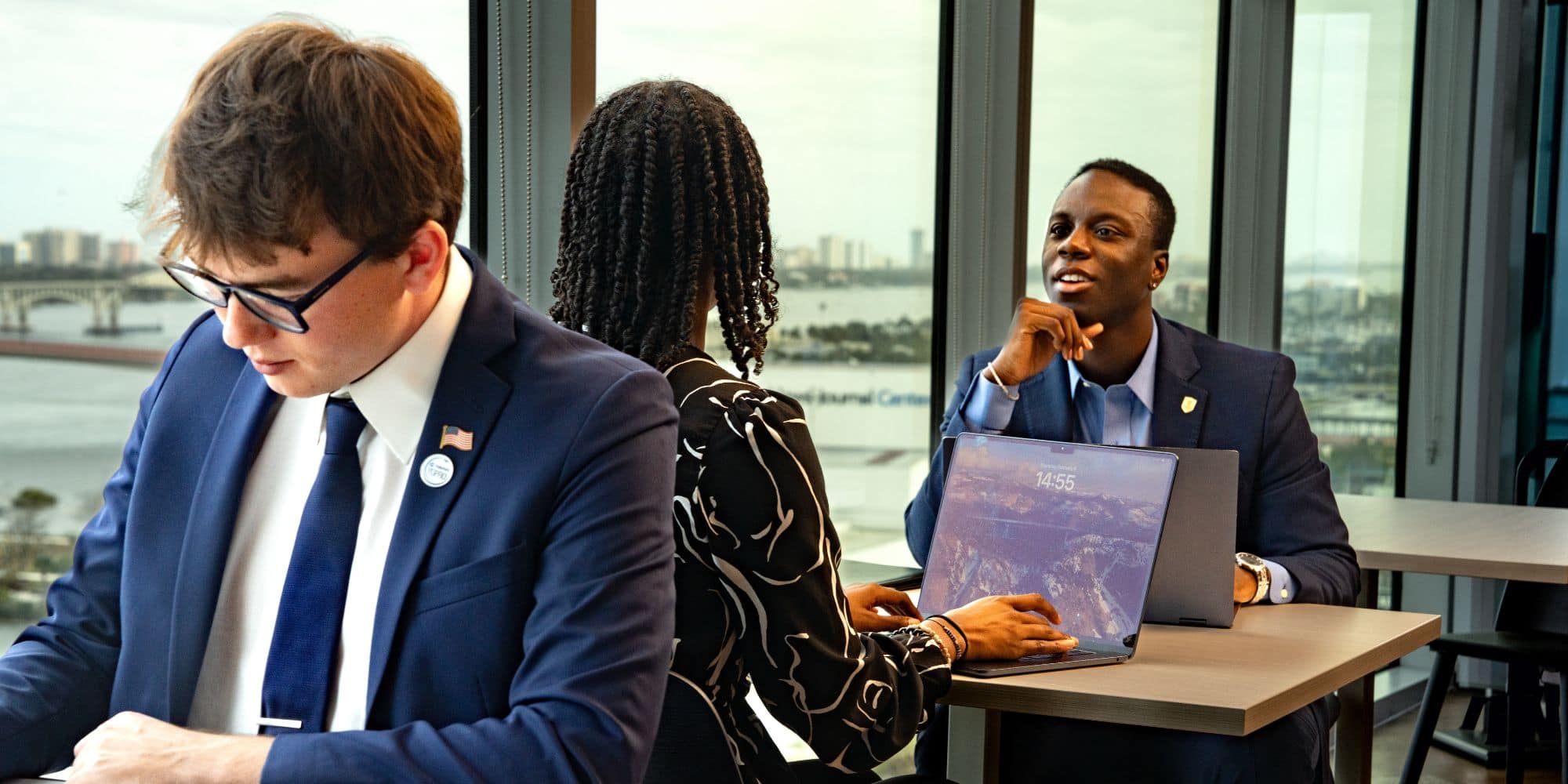 Embry‑Riddle Business Administration students collaborating in a conference room at the Brown and Brown building. (Photo: Embry‑Riddle/Bill Fredette-Huffman) 