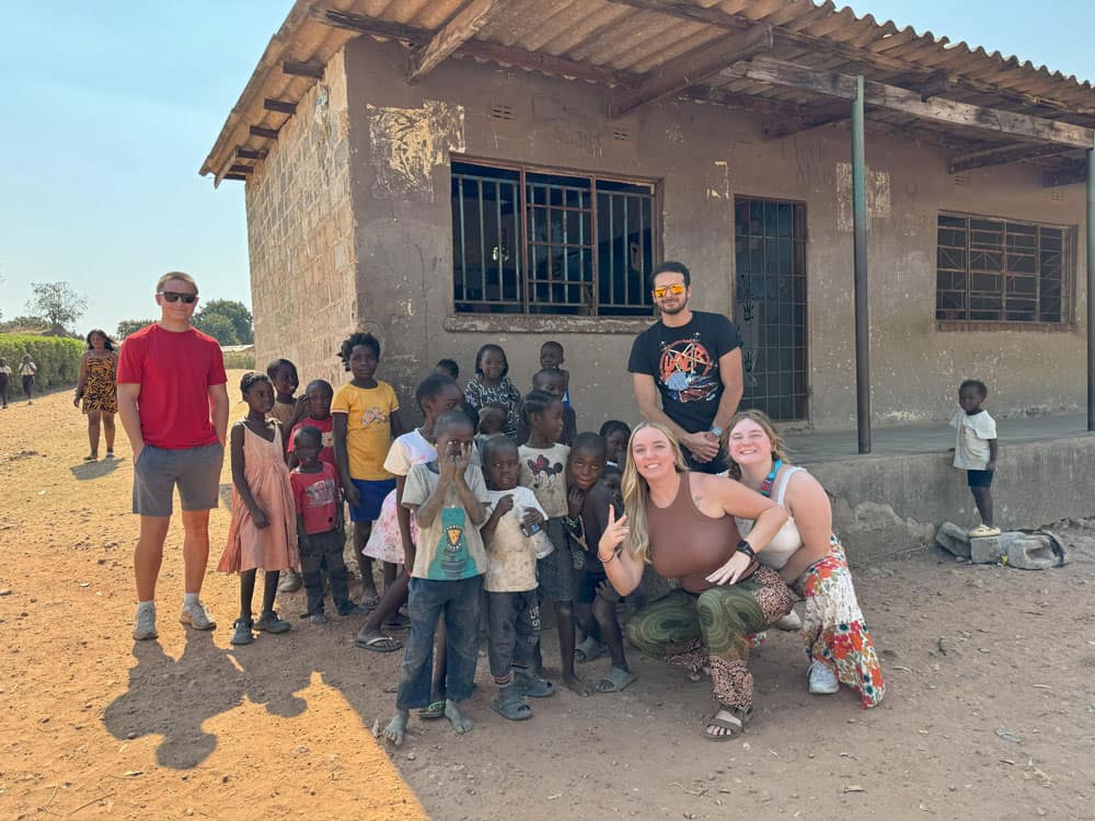 Elias "EJ" Bailey (left) studying abroad in Zambia.