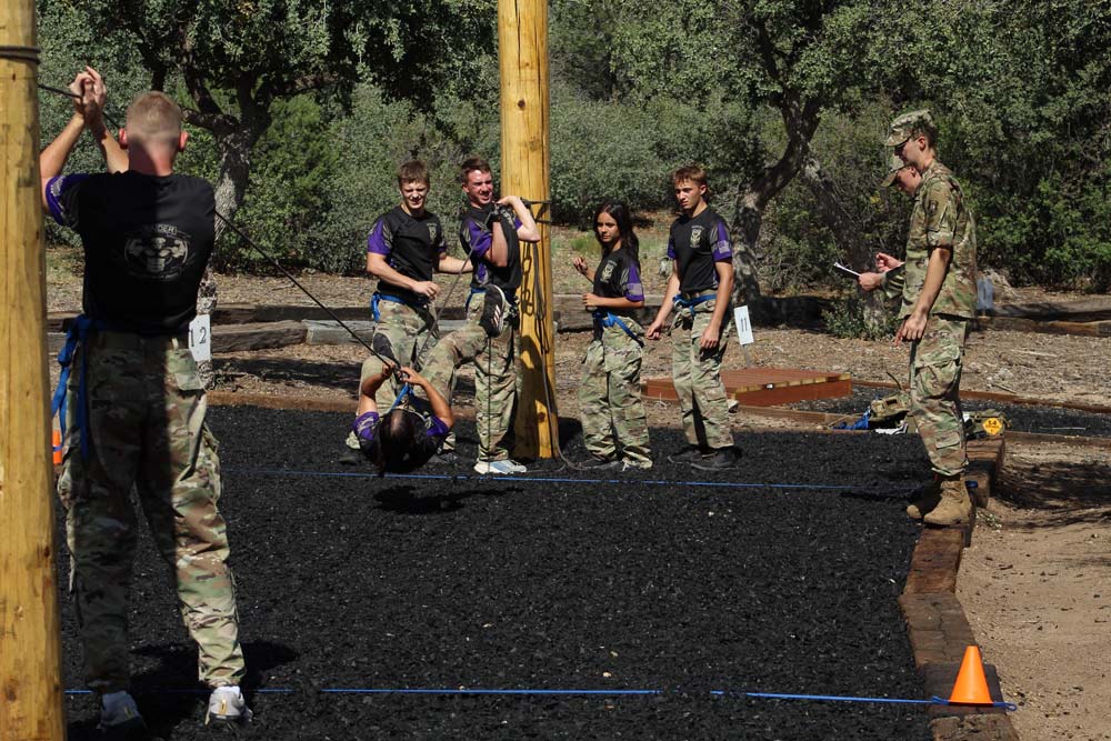 A JROTC Raiders Team tackles the One-Rope Bridge challenge (Photo: Cadet Evelyn Ackerman) 