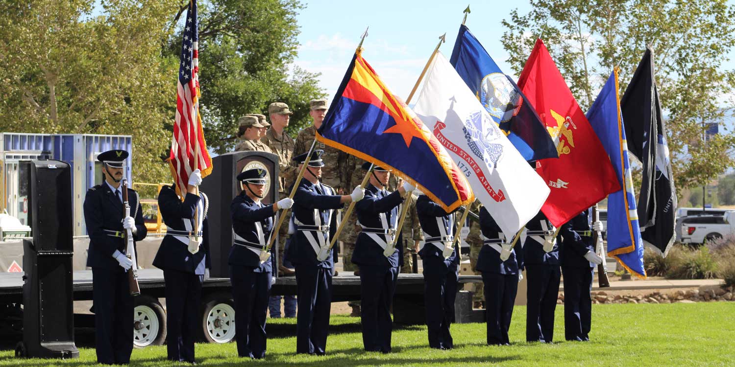 During the SWARM Opening Ceremony, Detachment 028 Honor Corps presents a joint service color guard as the Detachment 028 Eagle Quartet performs the National Anthem on stage (Photo: Cadet Evelyn Ackerman)