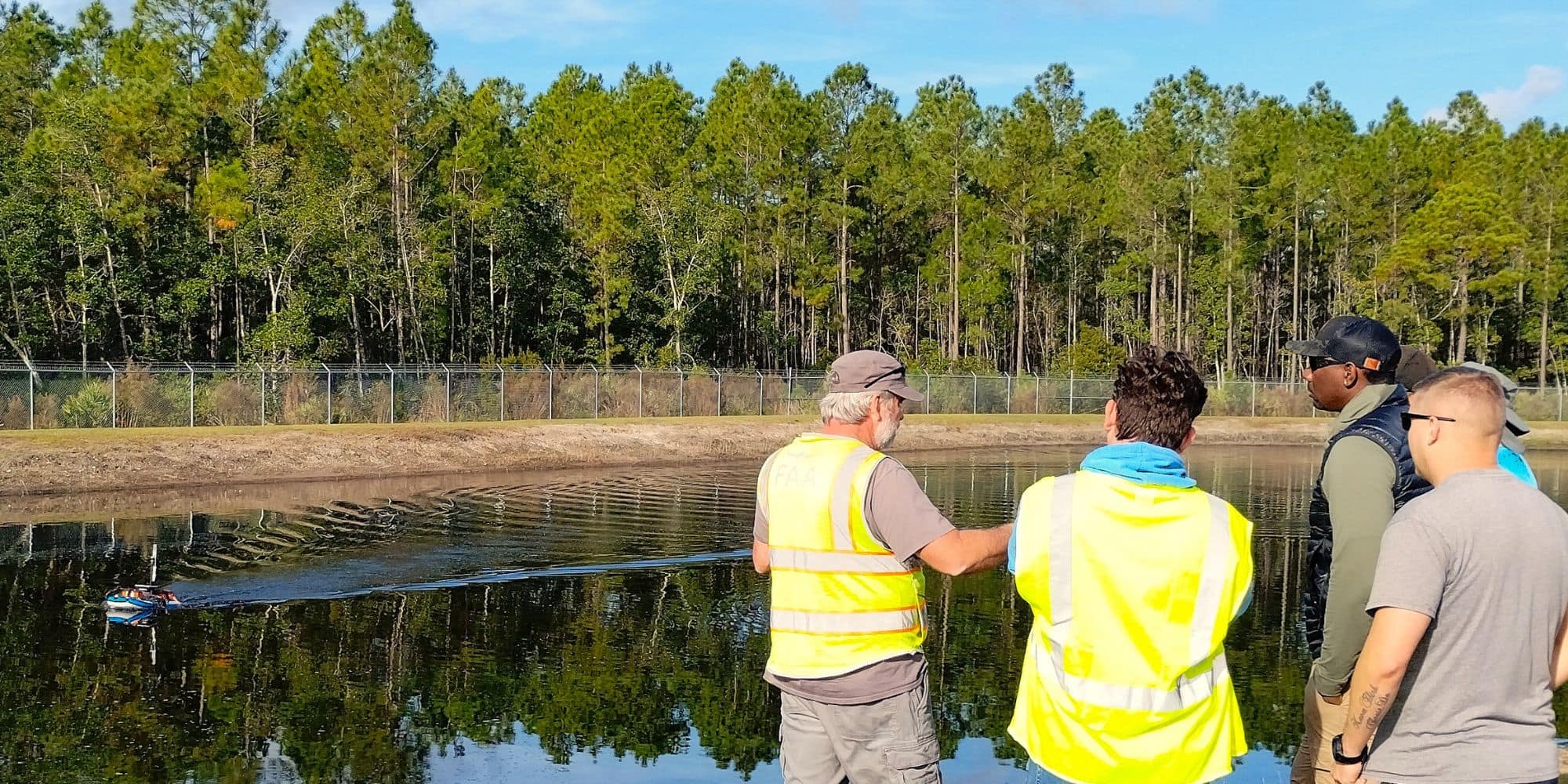 Students operate an uncrewed surface vessel with sonar systems during a recent residency. (Photo: David Thirtyacre)