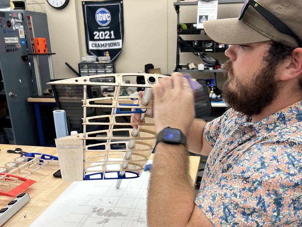 Embry-Riddle student files the end of the wing.