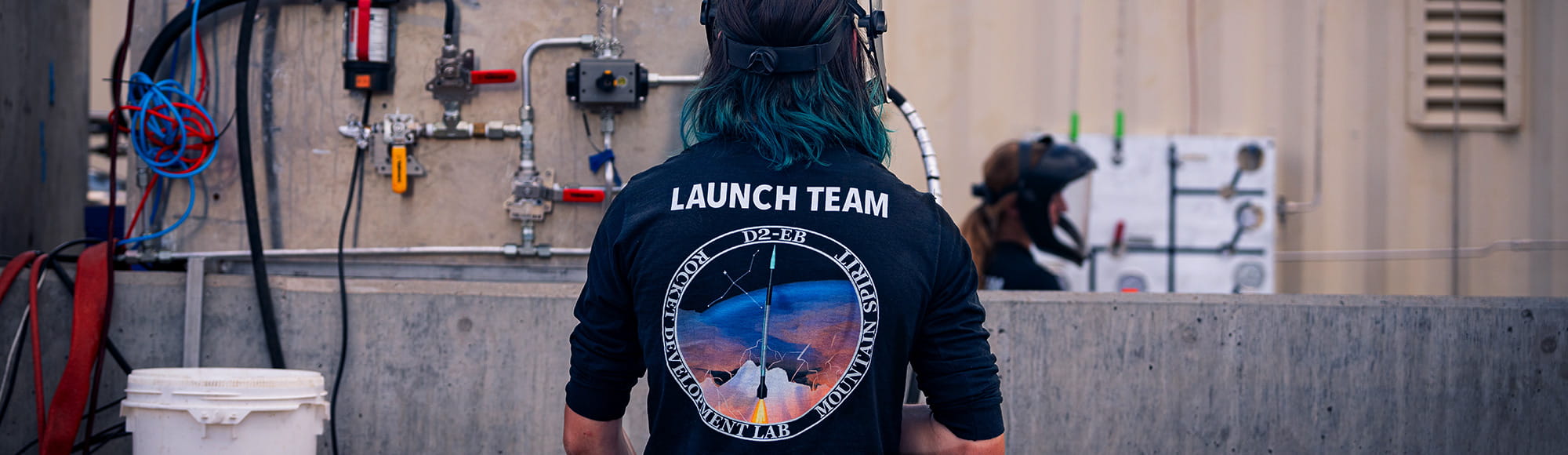 Students working on an amateur rocket