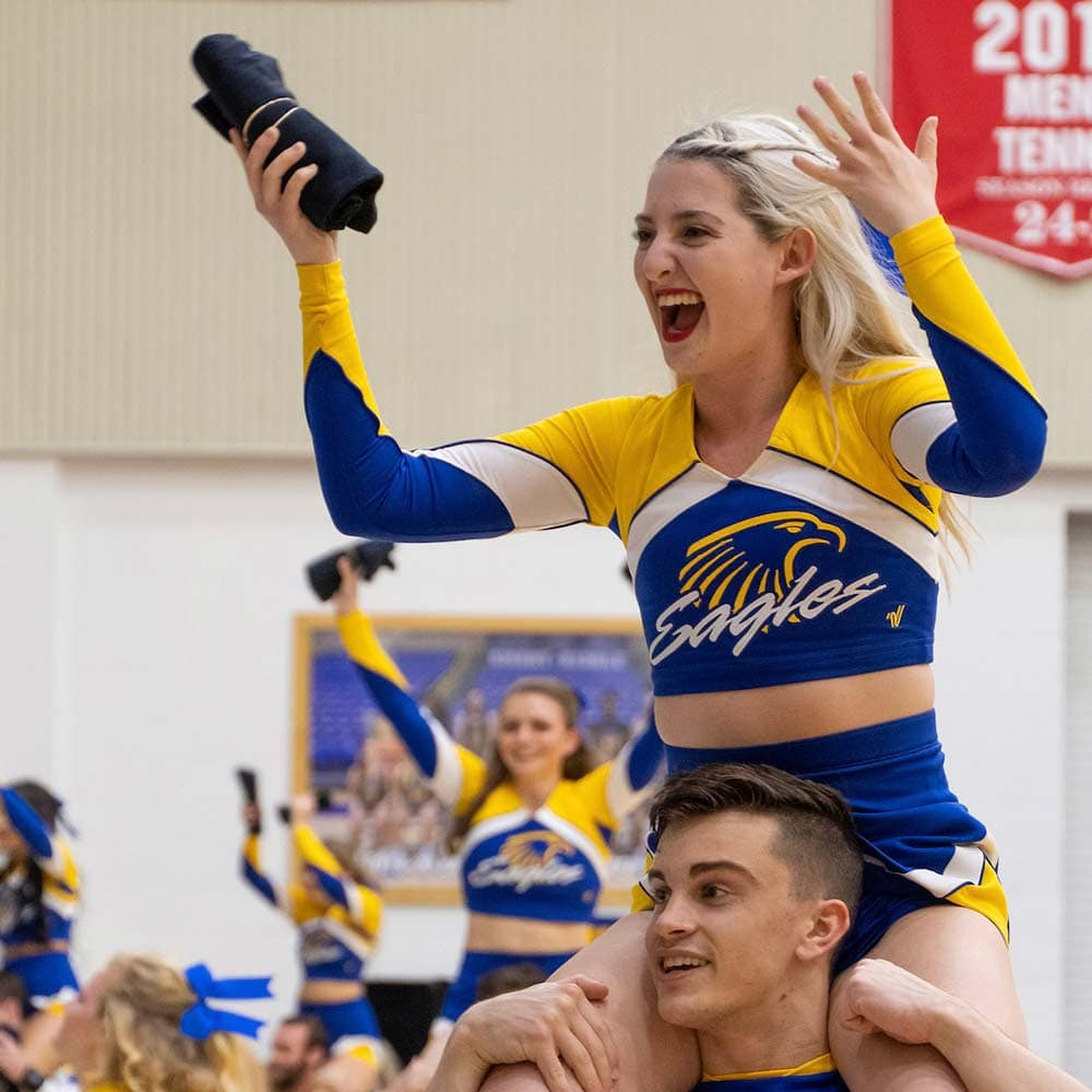 Embry-Riddle cheerleaders perform in a gym