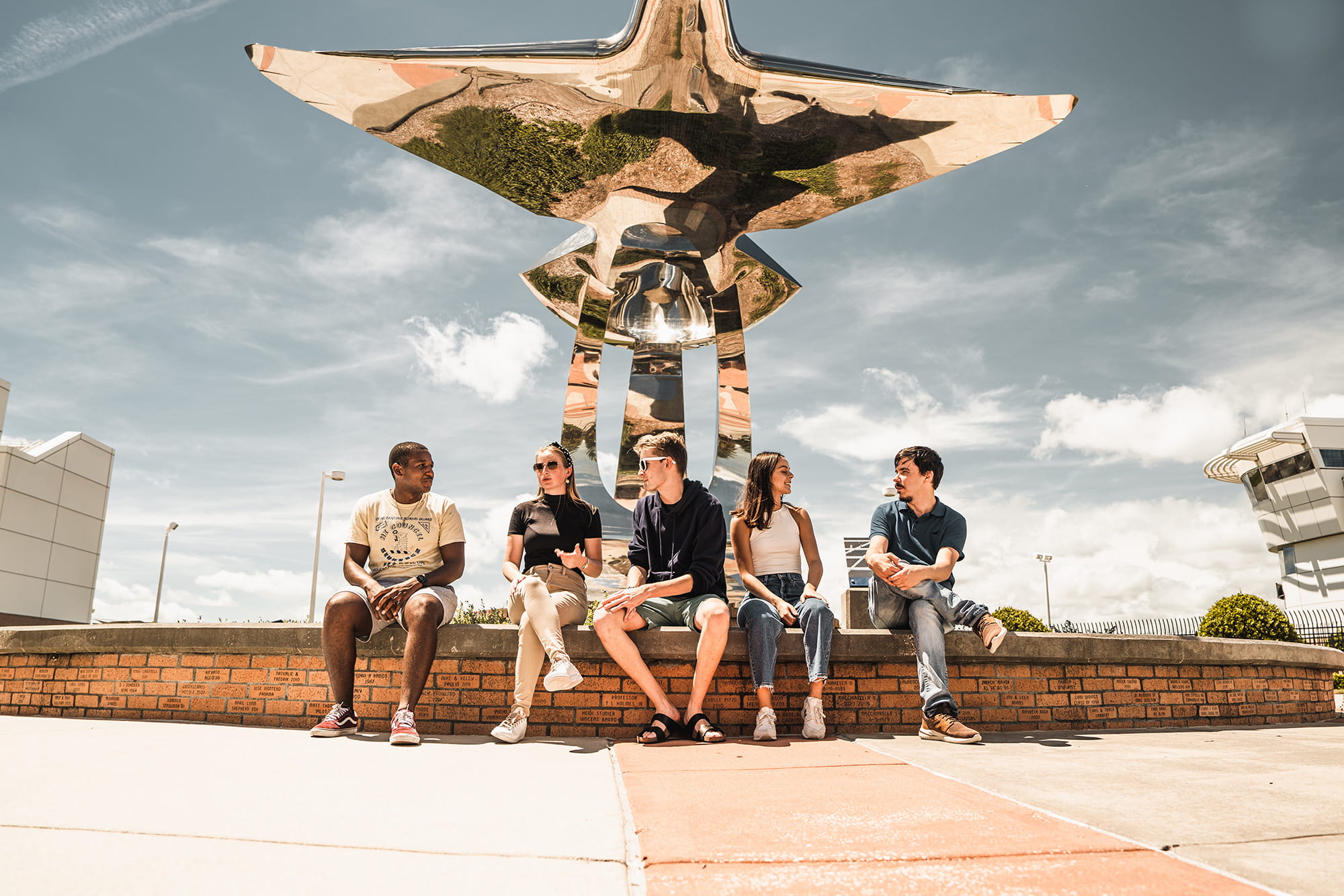 STUDENTS HANG OUT AROUND CAMPUS INBETWEEN CLASSES