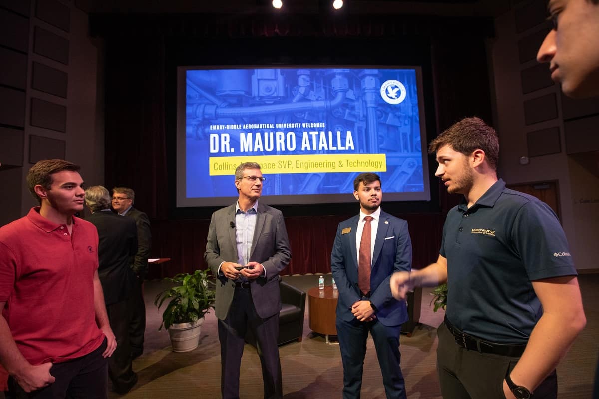 Mauro Atalla talks with students.