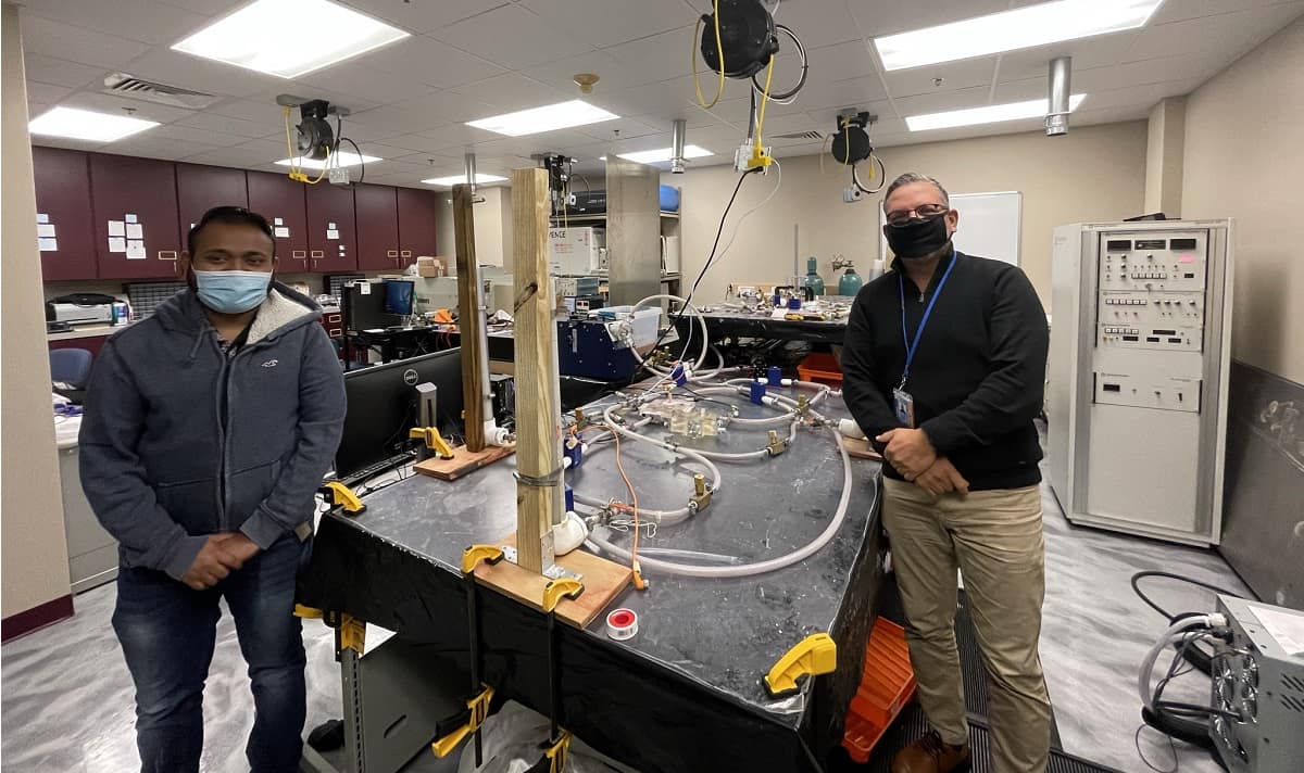 Professor of Mechanical Engineering Dr. Eduardo Divo and Ph.D. student Arka Das.
