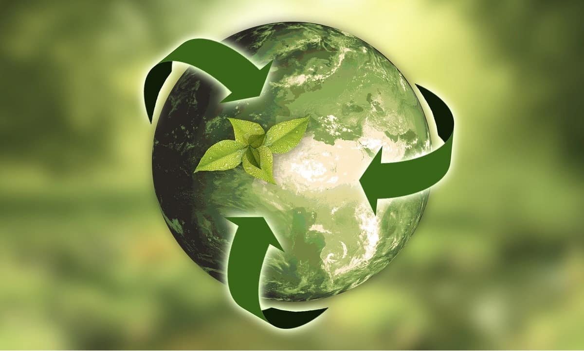 Green earth and recycle logo.