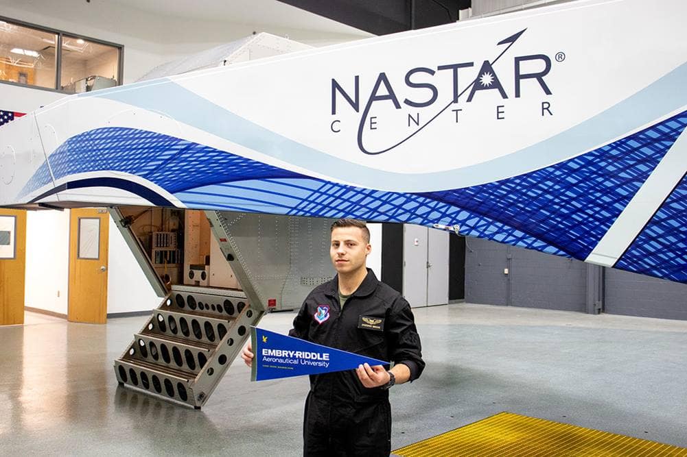Christopher Vanacore poses in NASTAR center.