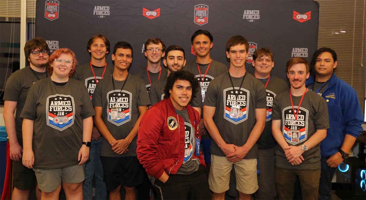 Several members of Embry‑Riddle’s Game Development Club pose for picture Armed Forces Jam event.