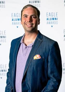 Dom Narducci poses for picture Eagle Alumni Awards.
