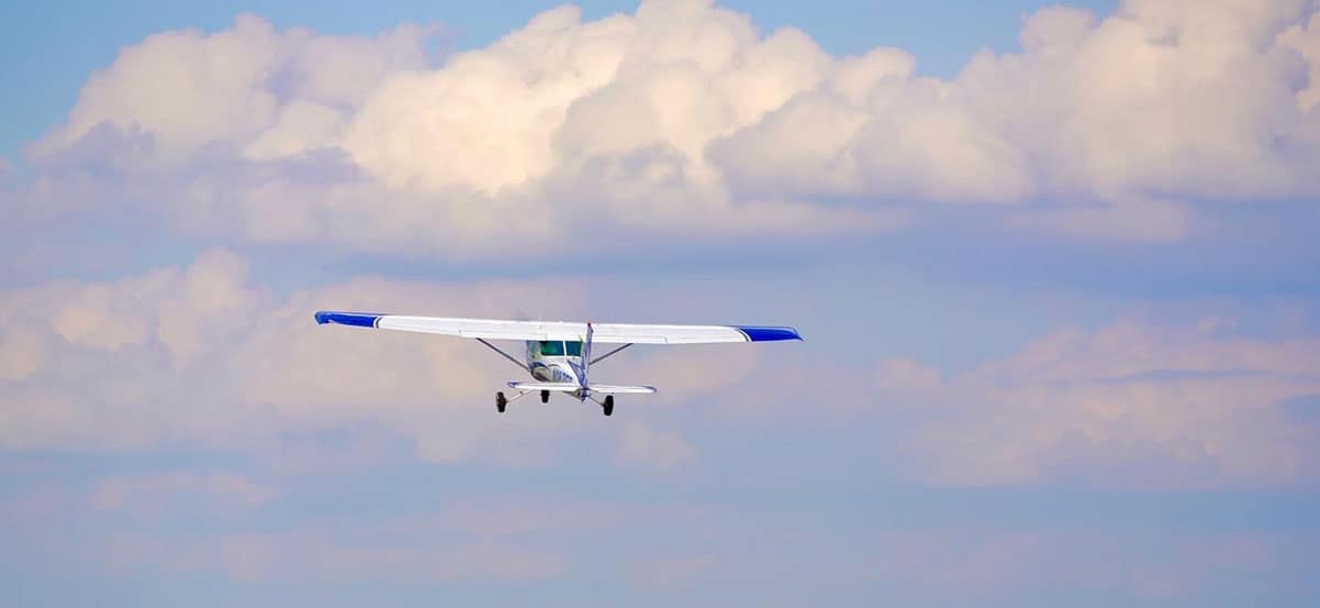Small place flies through clouds.