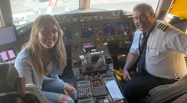 Michelle and Jason Tabor sitting in the flight deck