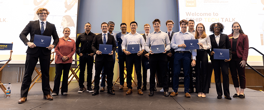 A group photo of featured ventures, along with distinguished panelists from Raytheon Technologies, NASA, the NSA, MIT and Halifax Health.