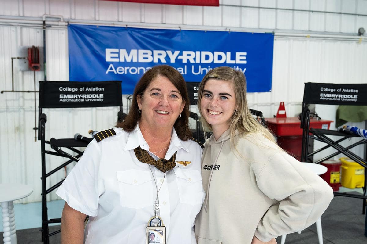 Embry-Riddle alumna Maura Schmid (‘84) poses with her daughter, Flight student Caroline Schmid.