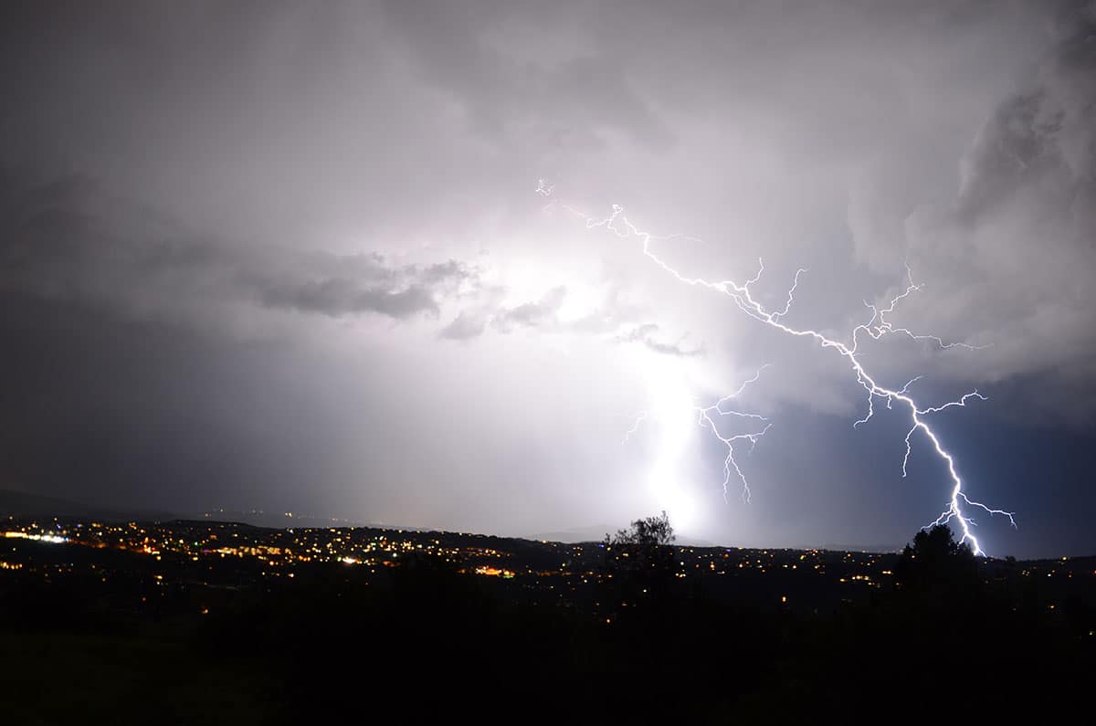 Lightning lights up the night sky.