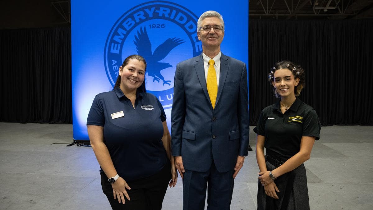 Embry-Riddle President P. Barry Butler stands with student leaders at the 2023 State of the University address.