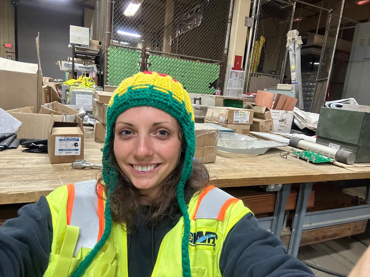 Why is B.S. in Engineering graduate Amanda Branton smiling? Because she loves her job as a civilian contractor for the U.S. Navy and her ongoing work as a mentor in the COMPASS program. (Photo: Amanda Branton)