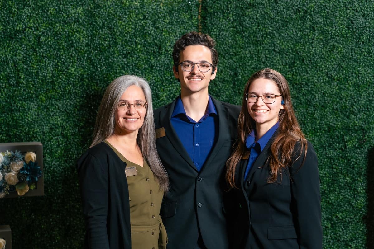 Dianne, Joey and Issa Meboe all received degrees from Embry‑Riddle Aeronautical University this spring (Photo: Embry‑Riddle/Connor Mcshane)