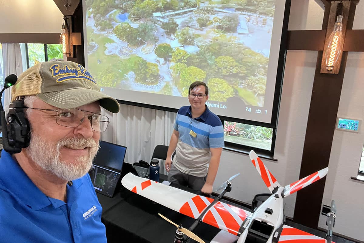 Dr. Dan Macchiarella and Embry‑Riddle student Tyler Deal greet guests at Science Sunday at the Brevard Zoo. (Photo: Dan Macchiarella)