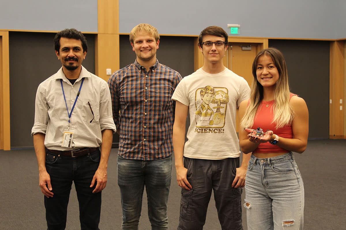 Dr. Morad Nazari posed with members of his Dynamics and Control Systems Laboratory: (left to right) Nazari, Brennan McCann, Marco Fagetti and Emily Suh (Photo: Morad Nazari)