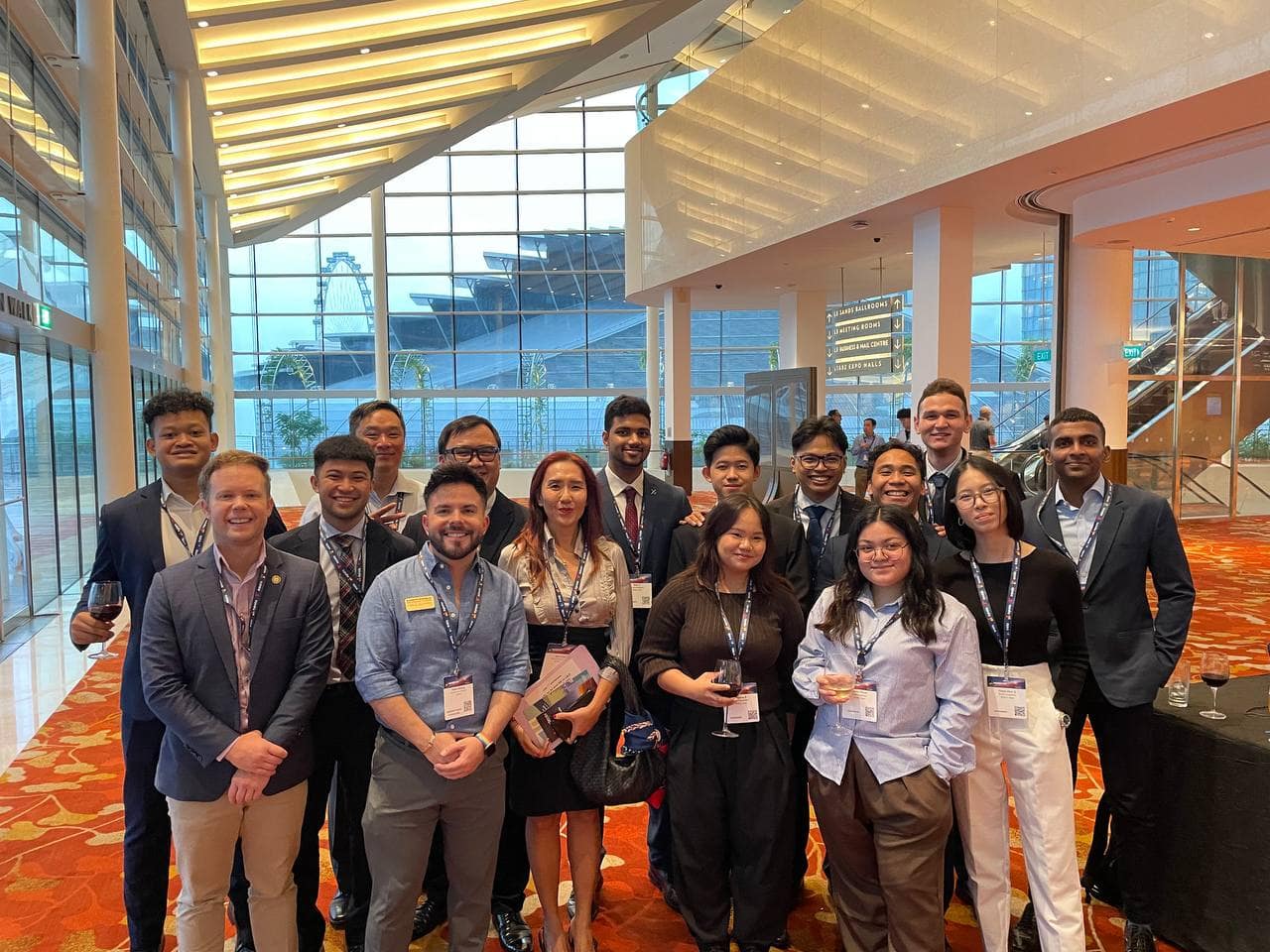 The Embry‑Riddle Asia Campus contingent gathers to celebrate a successful day at the recent Asia Pacific Airline Training Symposium. (Photo: Embry‑Riddle)