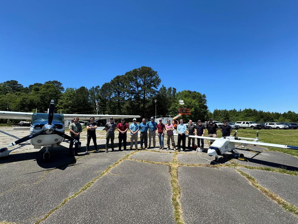 The LUCE project team stands in front of aircraft at a live flight demonstration in April at Accomack County Airport in Virginia. (Photo: LUCE Team)