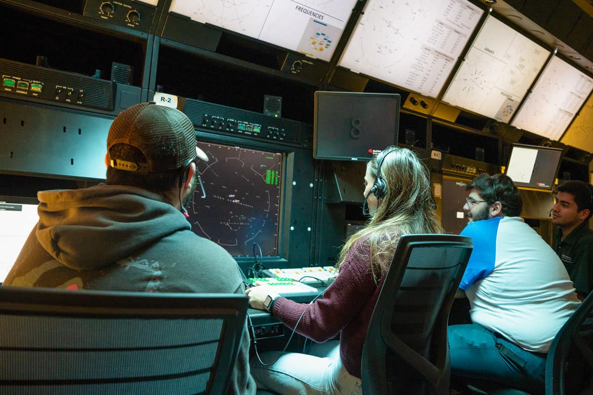 Air Traffic Management students work in Embry‑Riddle’s Terminal Radar Approach Control (TRACON) Lab, which integrates a simulation of the airspace used in training at the FAA Air Traffic Controller Academy. (Photo: Embry‑Riddle/Bill Fredette-Huffman)