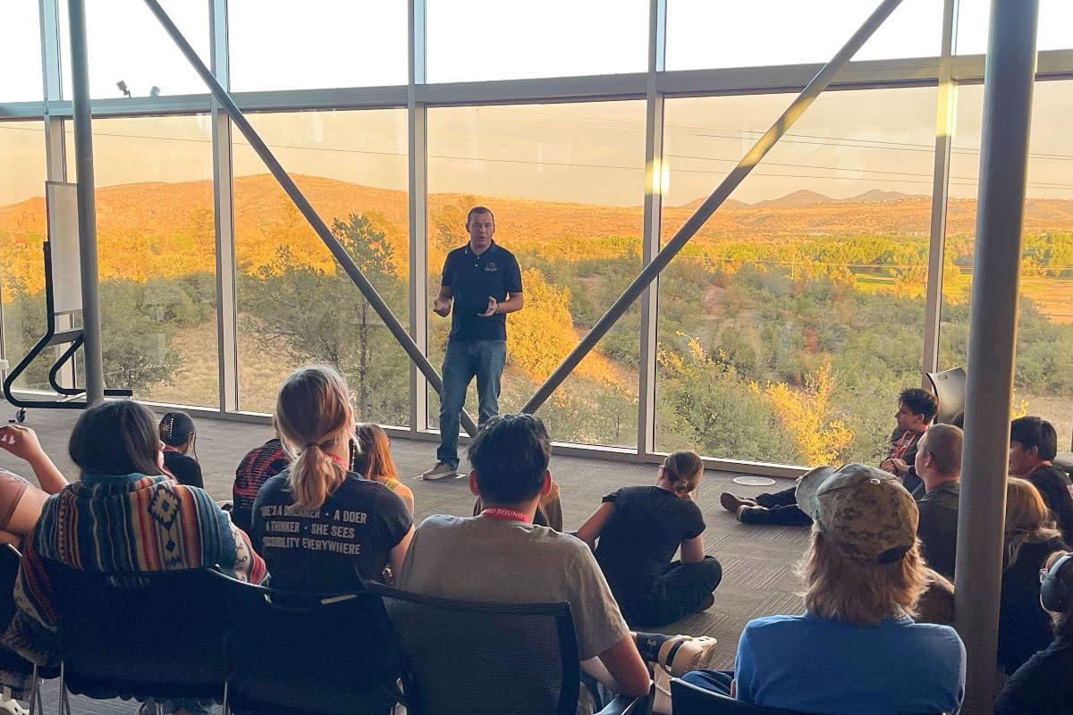 Embry‑Riddle alumnus Daniel Sullivan (’17) talks to students in the Upward Bound program at Embry‑Riddle Aeronautical University’s Prescott Campus. Sullivan, now a pilot, participated in the program as a high school student. (Photo: Embry‑Riddle/Sheryl Gillum)