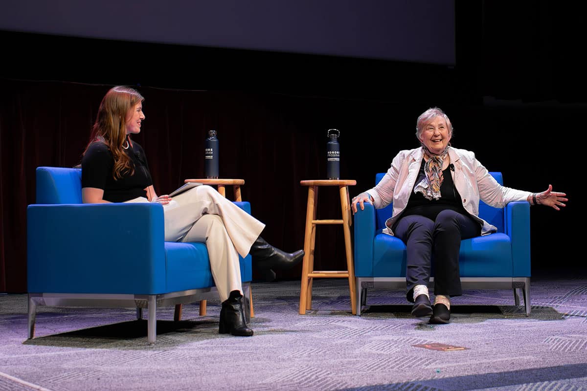 Embry‑Riddle Aeronautical Science student Madison Seymour (left) interviews Frances “Poppy” Northcutt, the first woman to hold an operational support role in NASA’s Mission Control Center. (Photo: Embry‑Riddle/Ryan Miller)